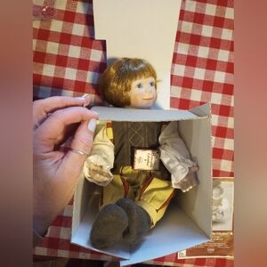 Porcelain Doll with Brown Hair and Blue Eyes